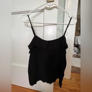 Black ruffle tank by Vestique. Large.